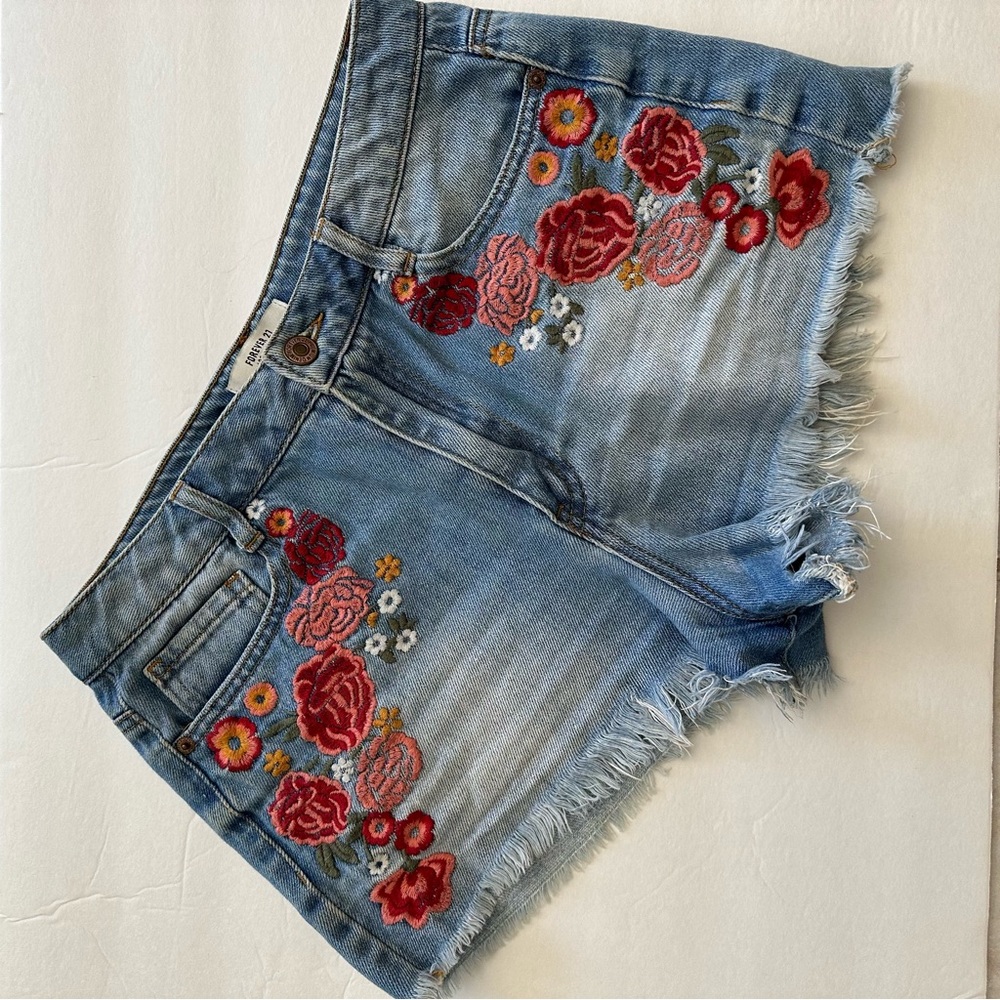 Denim cut off shorts with floral embroidery